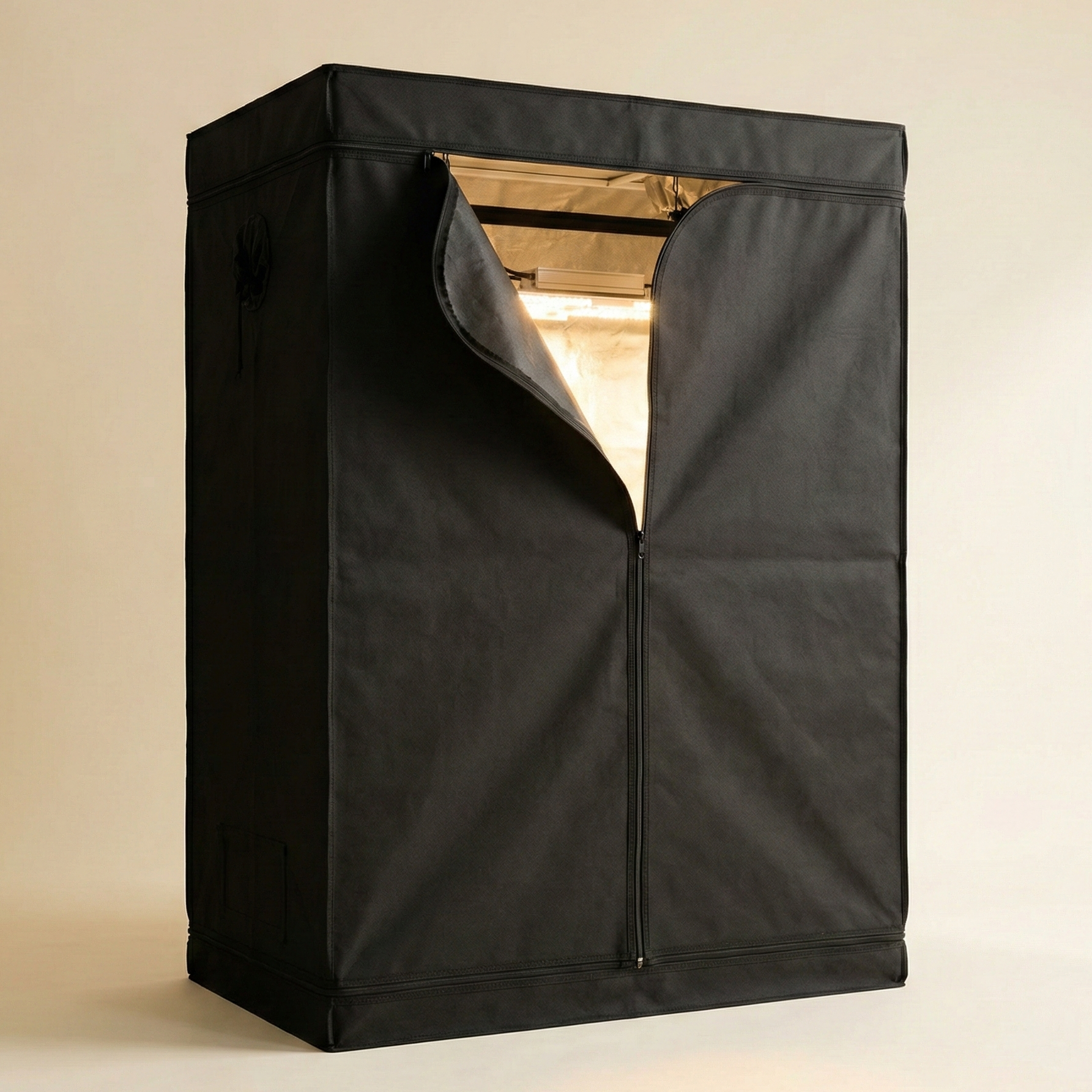 Black indoor grow tent enclosure with open zipper door revealing reflective silver Mylar interior, hanging LED grow light panel, and carbon filter ventilation system.