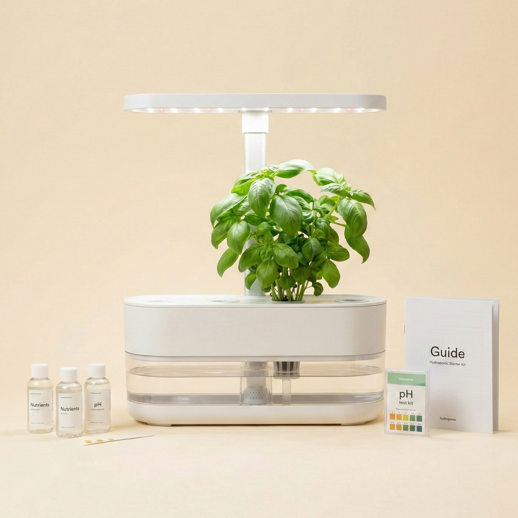 A sleek, modern all-in-one hydroponic starter kit featuring a healthy green plant.